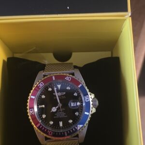 Invicta Gold and Two-Tone Watch with Red and Blue Bezel